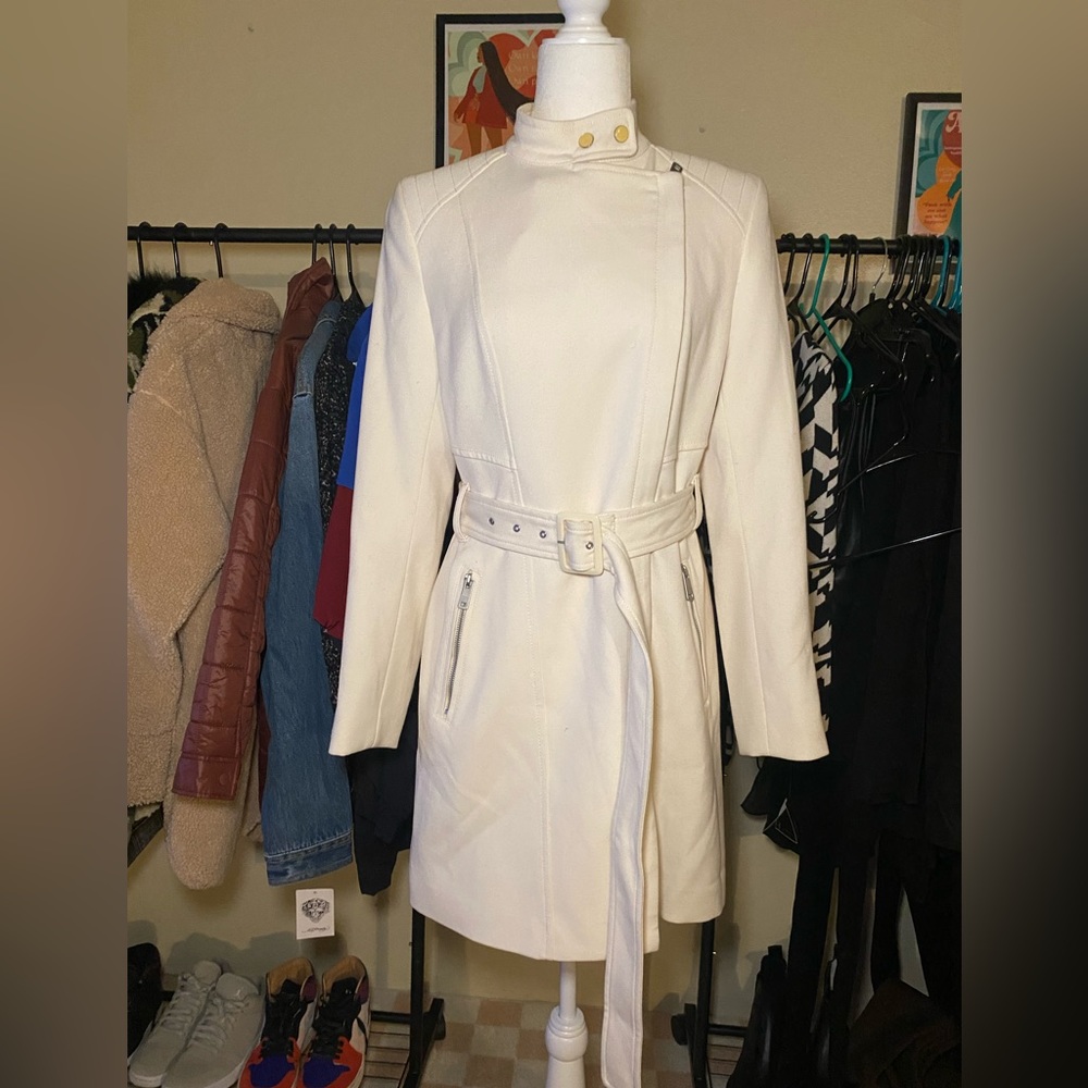 White belted Kenneth Cole coat.